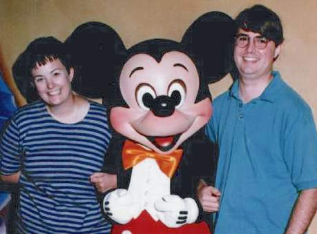 Robin and Paul visiting Mickey in Disneyland